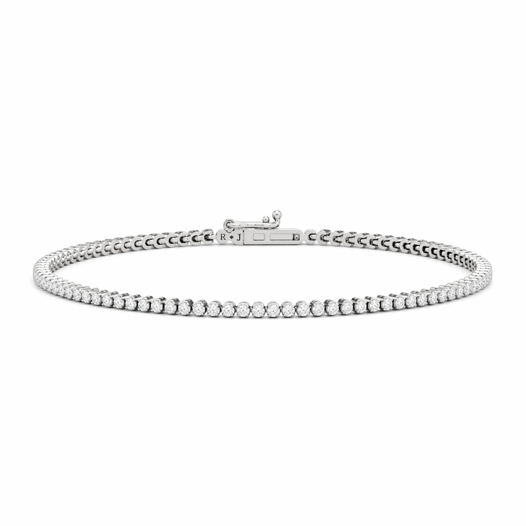18K white gold petite eternity diamond tennis bracelet with 92 four-prong set round lab diamonds