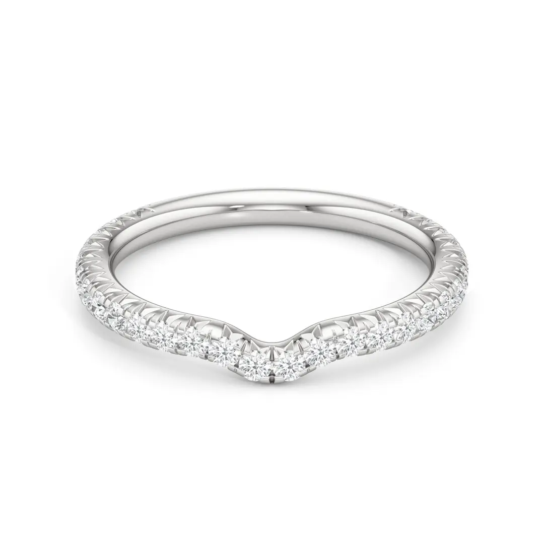 The W pavé diamond wedding band in 18K white gold, side angle showing W contour and 28-stone pavé