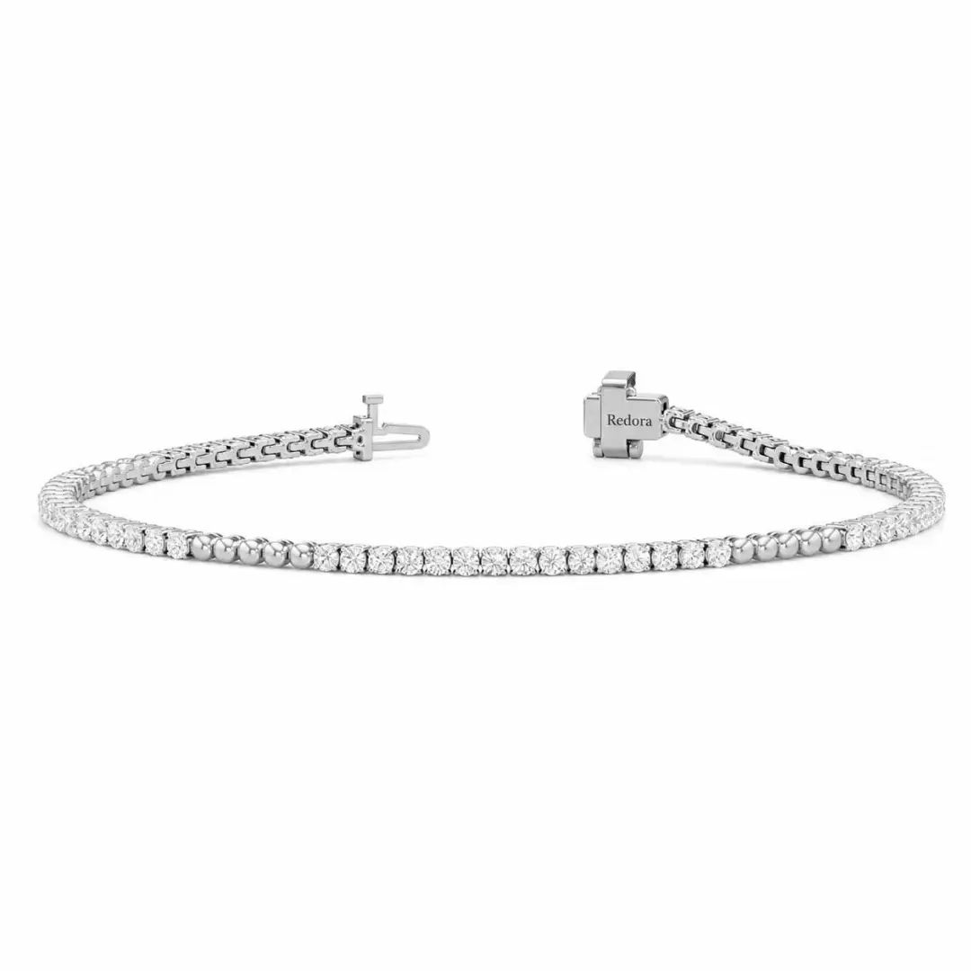 beaded diamond tennis bracelet in 18k yellow gold with 63 round lab diamonds on the front section and gold bead chain on the back
