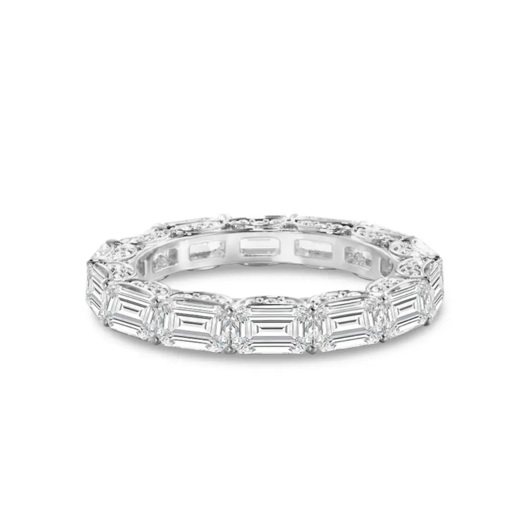 emerald cut eternity ring in 18k white gold, east-west sash setting with lab diamonds and round side accents