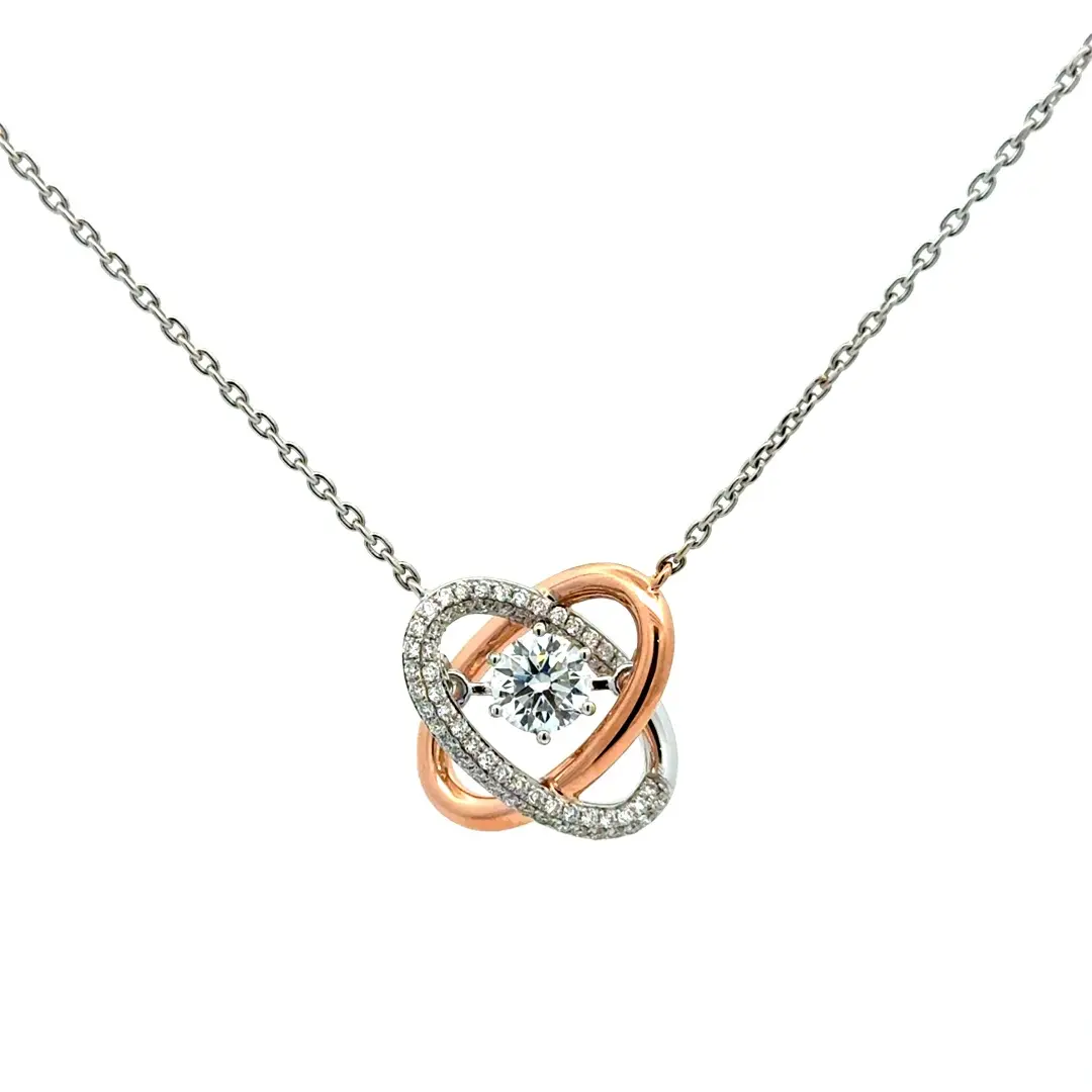 dancing diamond pendant necklace in 18k white and rose gold, two-tone interlocking circles with center lab diamond and pave halo