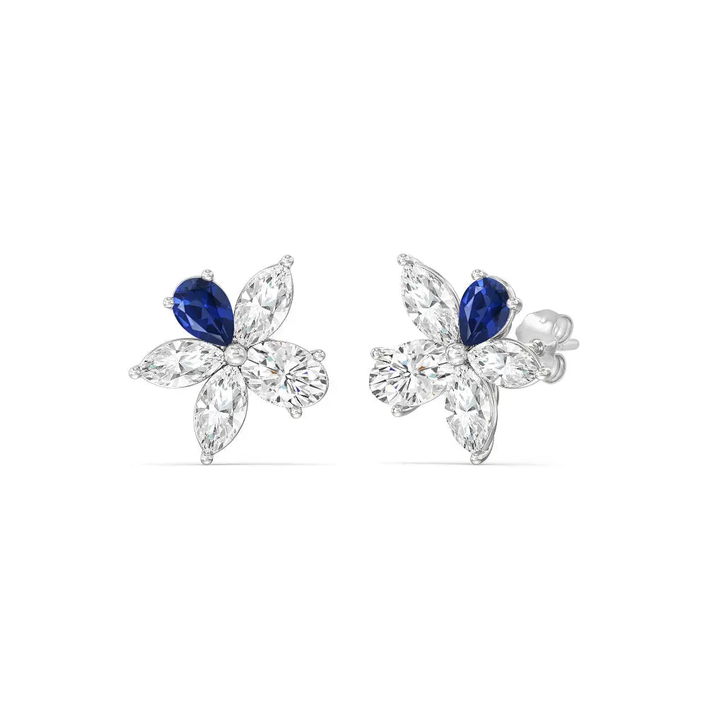 18K white gold sapphire flower stud earrings with pear-cut blue sapphire petal and lab diamond cluster, plumeria design, pair view