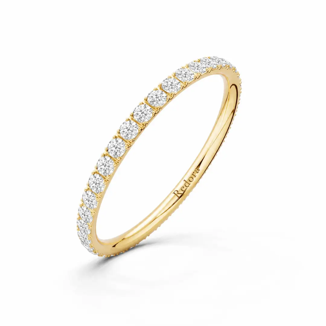 full pave stackable wedding band in 18k yellow gold with 38 round lab diamonds, angled view