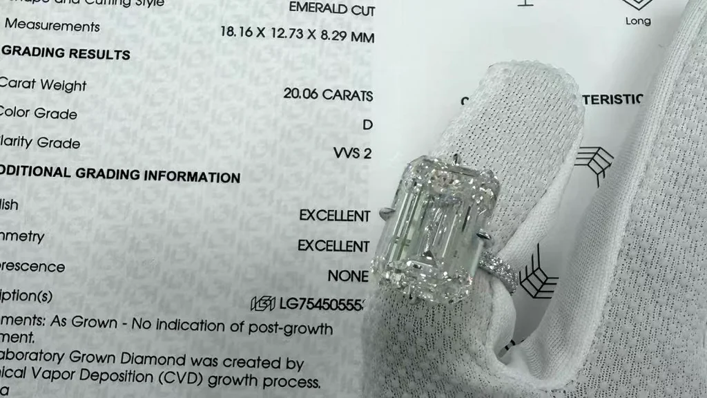 igi report showing a 20.06 carat emerald cut lab grown diamond measuring 18.16 x 12.73 x 8.29 mm with the ring alongside