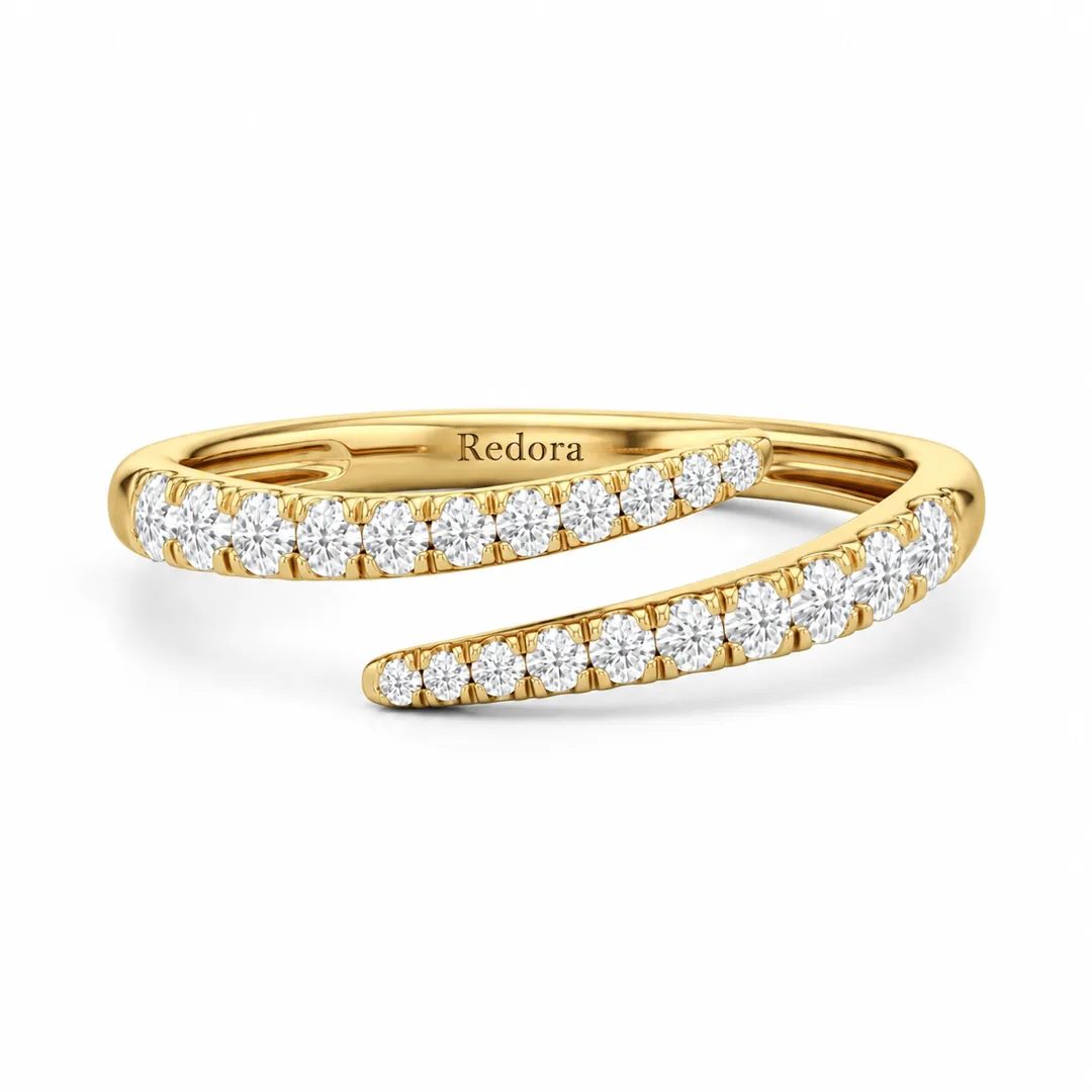 diamond crossover ring in 14k yellow gold, two pave set arms passing each other across the finger