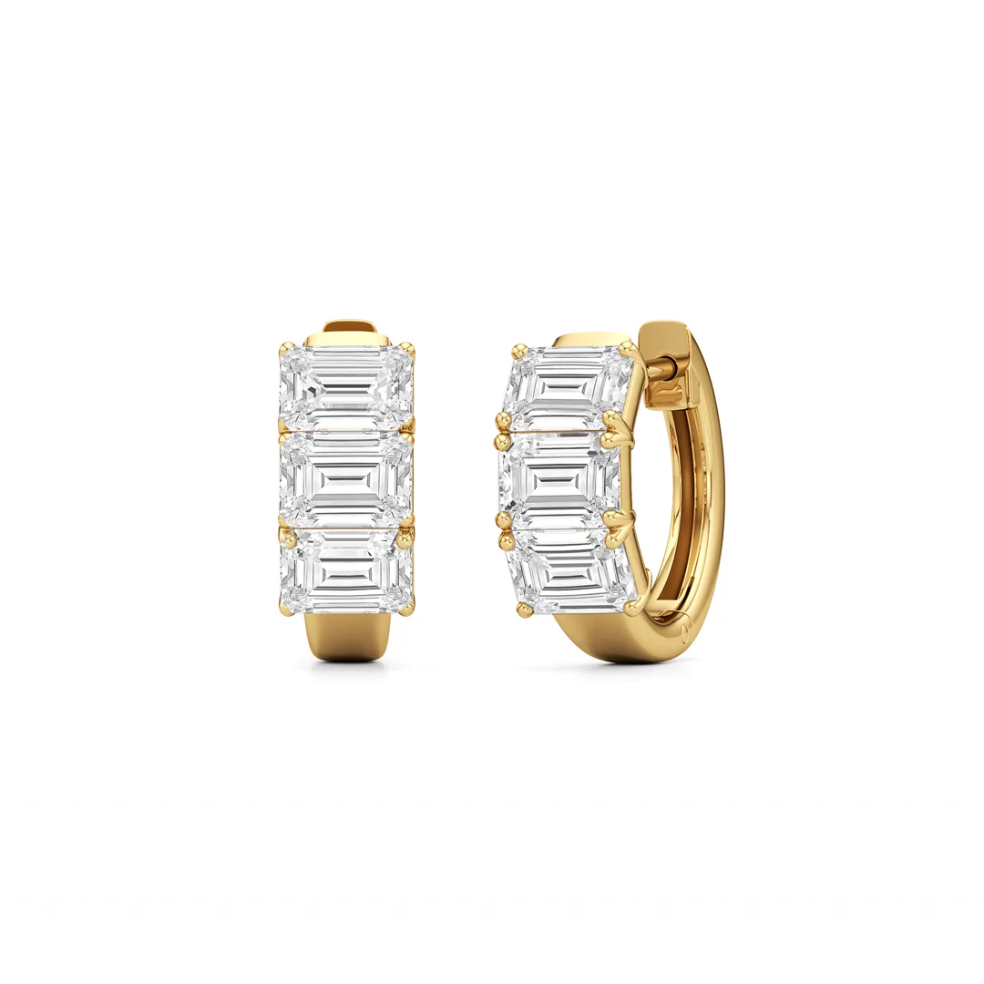 emerald cut diamond hoop earrings in 14k yellow gold, three east west set stones on each hoop