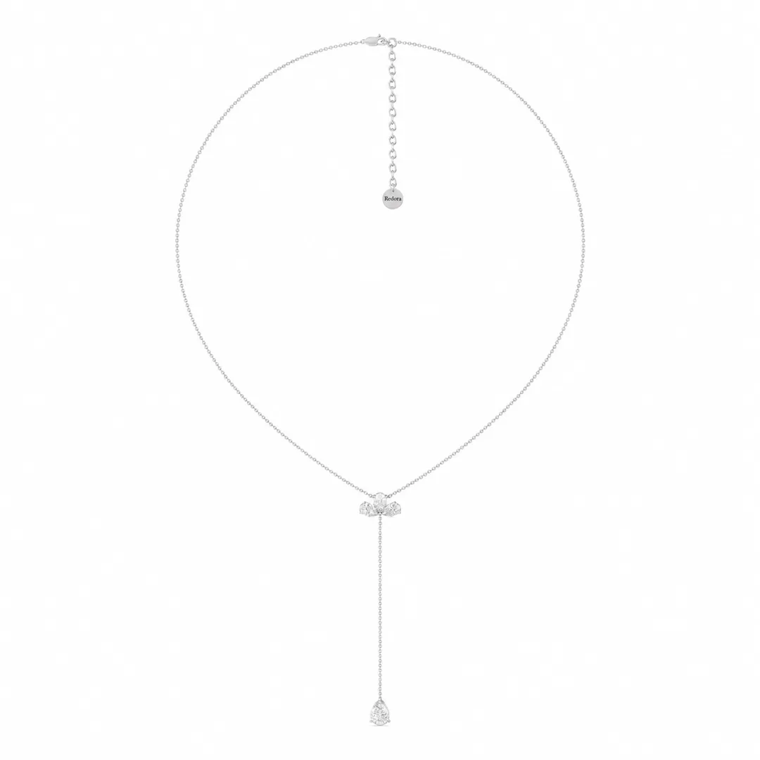 pear diamond y necklace in 14k white gold laid flat, three pear cluster with a pear drop