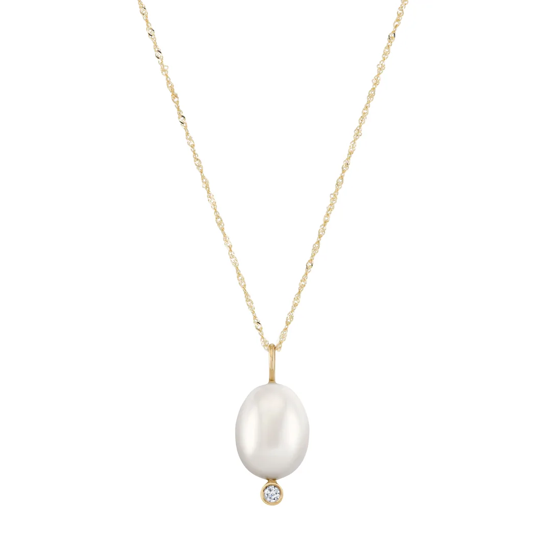 Cultured pearl diamond pendant on a yellow gold Singapore chain with one round diamond below the baroque drop