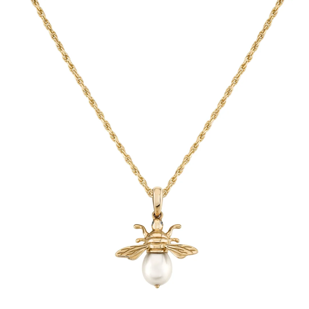 Cultured pearl bee pendant in yellow gold with diamond eyes shown on an optional chain