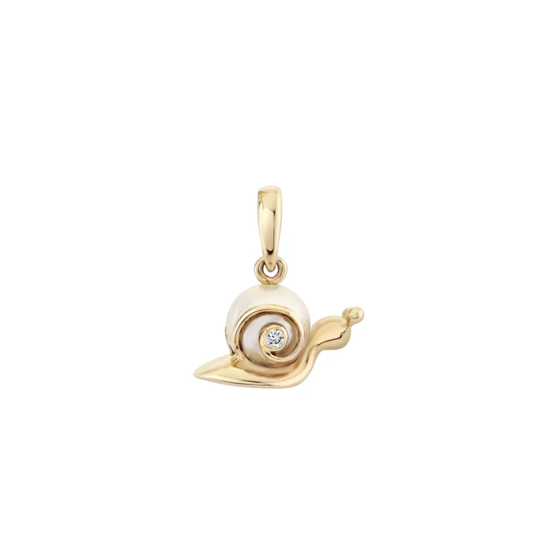 Cultured pearl snail charm in 14K yellow gold with a spiral shell, tiny diamond bezel and teardrop bail